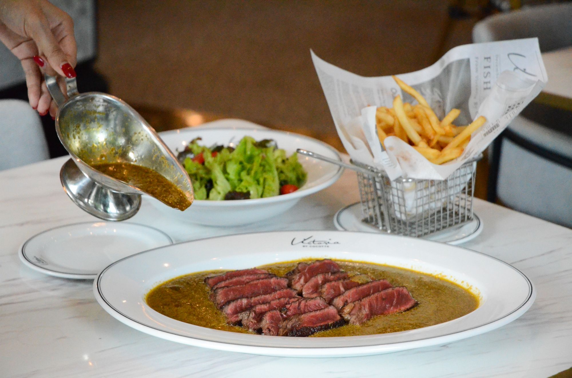 You will not get enough of the Café de Paris Steak (THB 1490) 