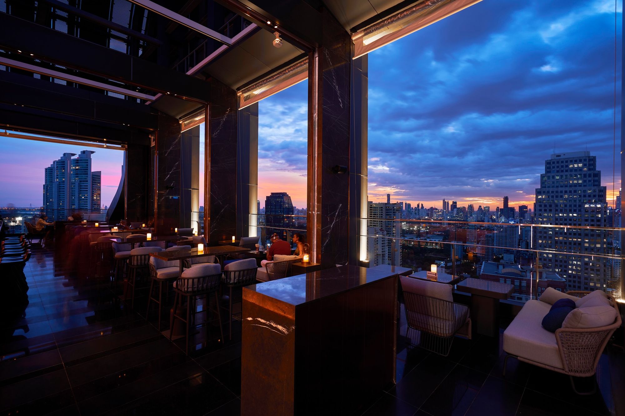 Nestled on the 34th floor of the Carlton Hotel, this bar offers breathtaking views of the city.